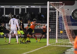 Danny Hylton heads in from close range to complete his hat-trick and score Town`s seventh goal