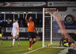 The ball is in the net and Danny Hylton has scored his second and Town`s fifth goal