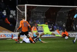 Jordan Cook goes close to scoring