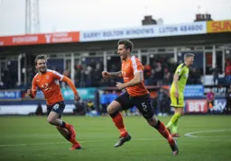 Johnny Mullins celebrates his goal with Luke Berry