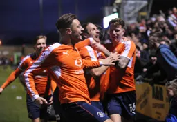 Supporters are happy,players are happy after Danny Hylton has scored Town`s second goal