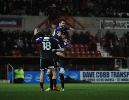Glen Rea gives Elliot Lee a lift after he had scored Town`s fifth goal