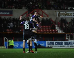 Glen Rea gives Elliot Lee a lift after he had scored Town`s fifth goal