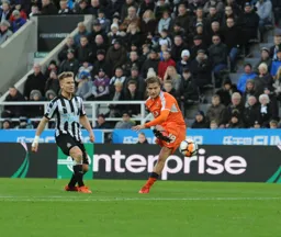 Luke Berry tries a shot at goal