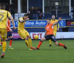 James Collins goes in toe to toe for the ball