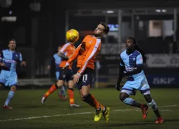 Andrew Shinnie chests the ball down