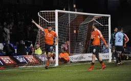 James Collins salutes scoring from the penalty spot