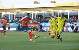 Danny Hylton takes a shot at goal