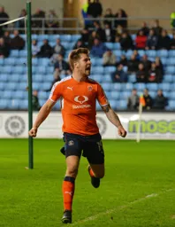 James Collins celebrates his late equalizer