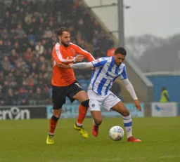 Andrew Shinnie attempts to steal the ball