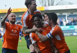 Pelly-Ruddock Mpanzu celebrates scoring the third goal with Alan McCormack, Glen Rea and Alan Sheehan