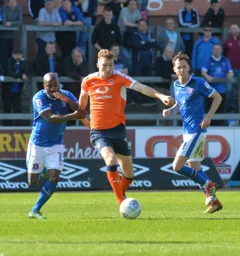 Jack Stacey brings the ball forward