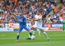 Sonny Bradley trying to win the ball back