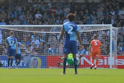 James Shea saves a penalty