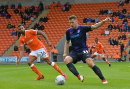 James Collins makes his way up the pitch