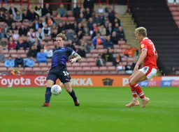 Glen Rea beats Cameron McGeehan to the ball