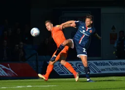 James Collins tussles for the ball