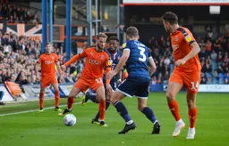 Andrew Shinnie tries to get out of a tight spot