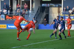 Sonny Bradley and Dan Potts going for the same ball