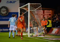 Danny Hylton watches the ball go into the back of the net