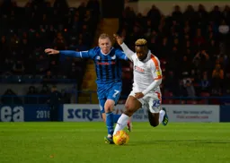 Kazenga LuaLua travelling up the pitch with the ball under close control