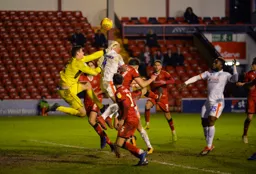 Kazenga LuaLua watches as the late leveller goes in