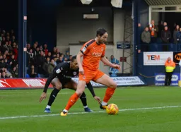 Danny Hylton being closely watched