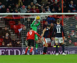 James Shea jumps to catch the ball