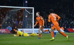 Luke Berry runs away in celebration of his goal