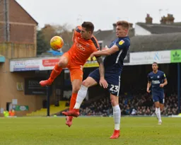 James Collins battles for the ball