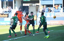 Sonny Bradley heads towards goal