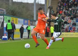 Matty Pearson beats his marker to the ball