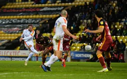 Andrew Shinnie goes for goal