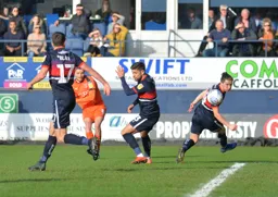 Luke Berry goes for goal and his effort will be headed in by Danny Hylton