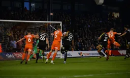 James Collins smacks the ball home