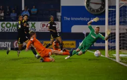 Luke Berry tries to put the ball past Aaron Ramsdale