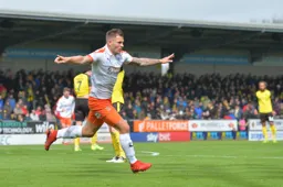 James Collins celebrates scoring a goal