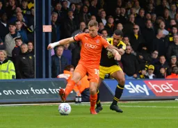 James Collins holding back his man