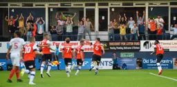 Matty Pearson pats Martin Cranie on the head after putting the Town 2-1 ahead