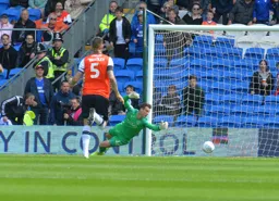 Simon Sluga is beaten