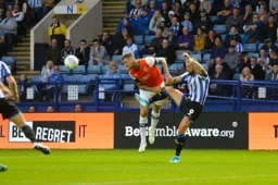 Sonny Bradley wins this battle with Steven Fletcher