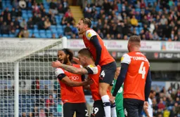 Harry Cornick, Izzy Brown and Ryan Tunnicliffe come to celebrate with James Collins