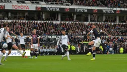 Sonny Bradley has a dig from just inside the box