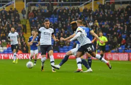 Dan Potts and Kazenga LuaLua go hunting for the ball