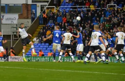 Sonny Bradley has a header at goal from a corner