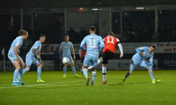 Andrew Shinnie has a go from the edge of the box