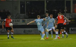 Sonny Bradley fires one in from the edge of the box