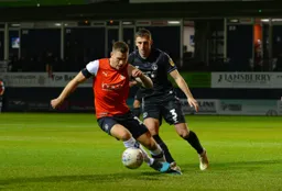 James Collins turns away from Ben Purrington