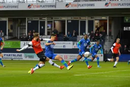 Andrew Shinnie sends in a cross which evades Antonee Robinson