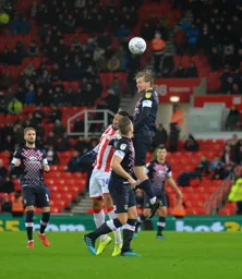 Luke Berry rises highest leaving Jordan Cousins on the floor